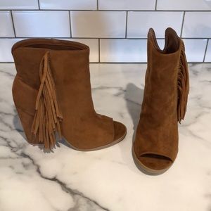 Peep toe booties with fringe